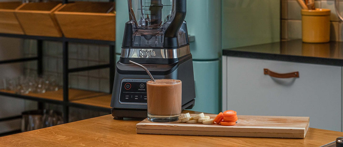 Blender with chocolate smoothie