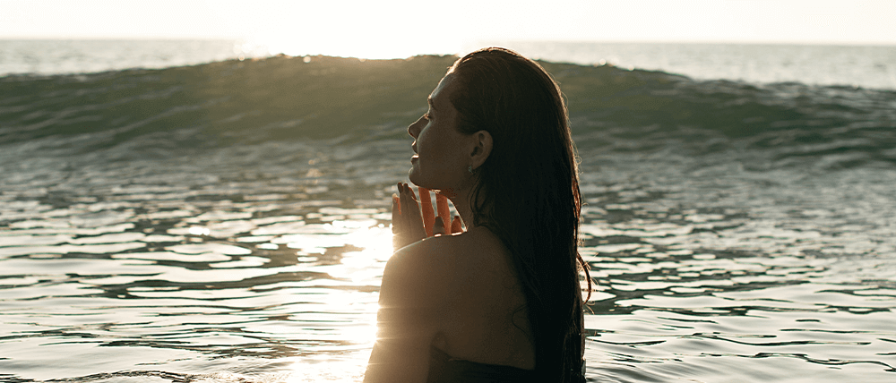 Woman enjoying the ocean
